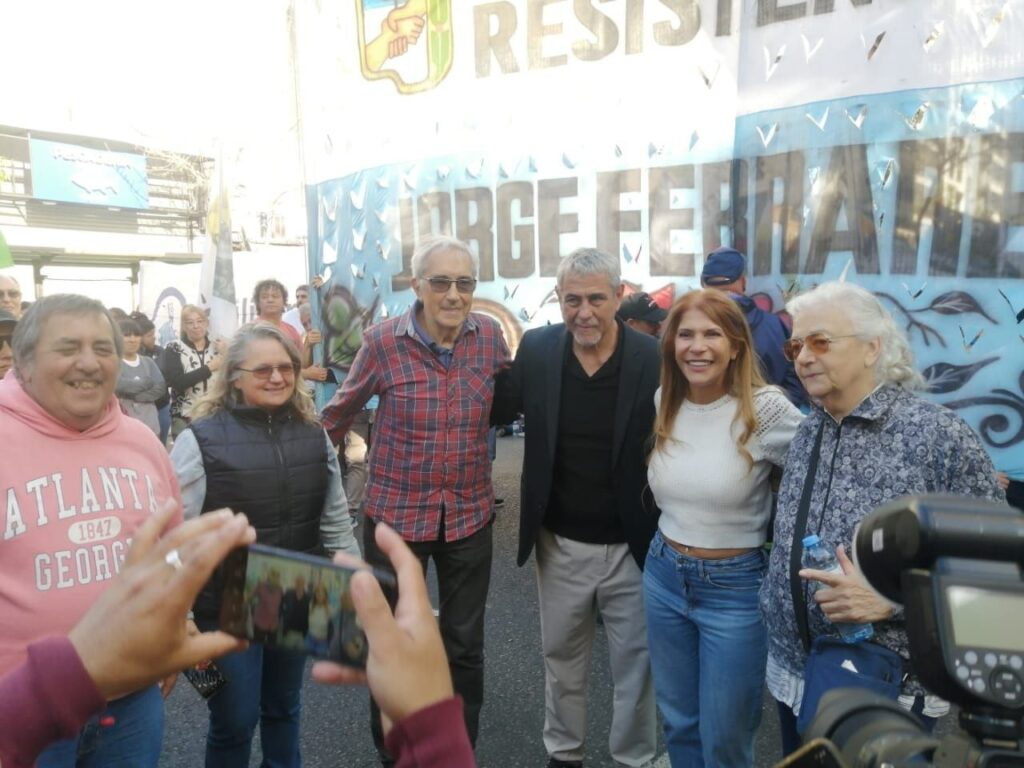 a group of people standing in a crowd